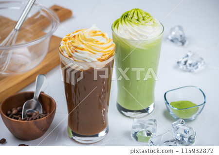 Caramel frappe and matcha frappe on white table Caramel frappe and matcha frappe on white table 115932872