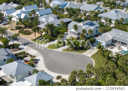 Residential houses in living area in Boca Grande, FL. American dream homes as example of real estate development in US suburbs 115934561