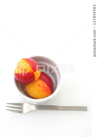 Oishi plum cocotte with fork, top view 115934563