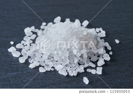 Rock salt and black background Rock salt and black background 115935053