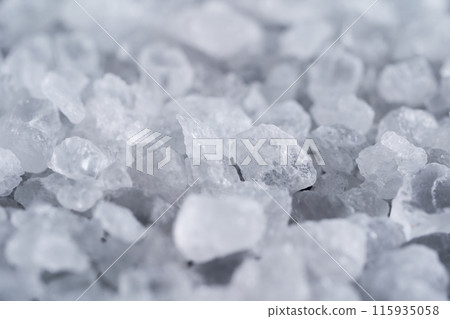 Rock salt and black background 115935058