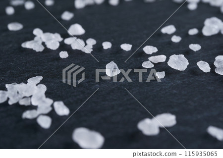 Rock salt and black background 115935065