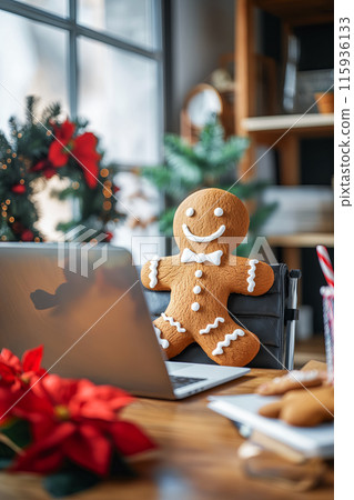 Vertical card with gingerbread man on laptop, office decorated with holly and Christmas wreath, on the table there is a pot of poinsettia flower and candy canes, wish you a Merry Christmas Vertical card with gingerbread man on laptop, office decorated with holly and Christmas wreath, on the table there is a pot of poinsettia flower and candy canes, wish you a Merry Christmas 115936133