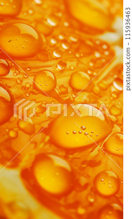 Macro photograph of a juicy orange slice emphasizing the bright and juicy shades of the fruit, an idea for a background or vertical screensaver for your phone 115936463