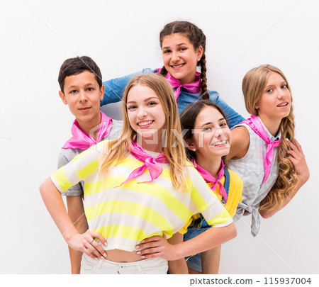 cute teenage children standing one by one on white background 115937004