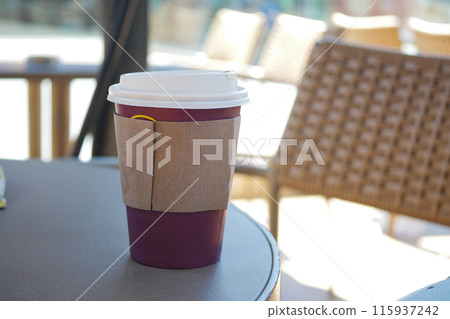 Blank take away kraft coffee cup on table , 115937242