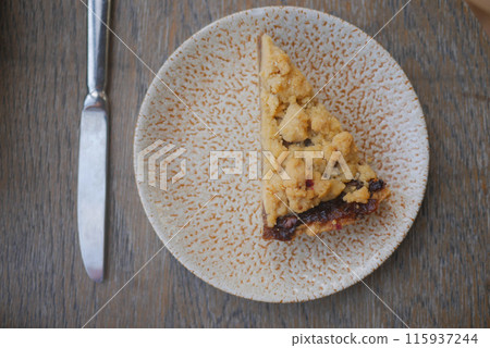 slice of apple pie cake on a plate  115937244