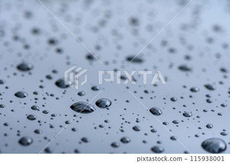 raindrops on glass window of car with cloudy sky in the background 4 raindrops on glass window of car with cloudy sky in the background 4 115938001