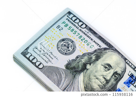 stack of dollars with angry face of Franklin 115938116