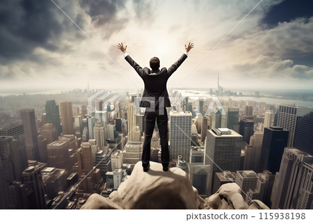 Businessman Triumphantly on City Skyline 115938198