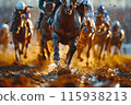 Horse racing action on a muddy track 115938213