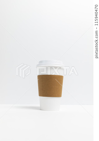 Isolated Paper Coffee or Tea Mug, Cup with White Lid and Corrugated Sleeve On White Background. Eco Hot Tea Cup For Beverage Or Drinks, Vertical Plane, Copy Space. On the Go Foodservice Application. 115940470