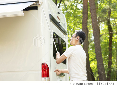 Camper and man 115941223