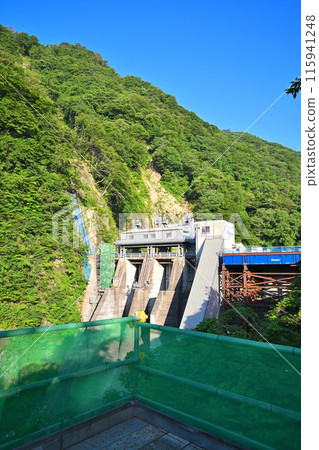 Aimata Dam, view from the temporary observation deck, Sarugakyo, season of fresh greenery 115941248