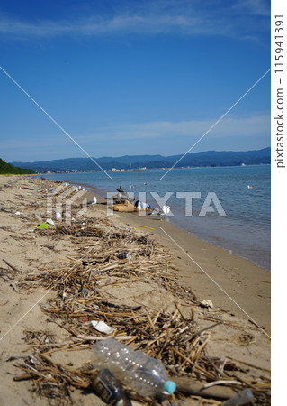 Garbage washed up on the beach due to the typhoon 2 Garbage washed up on the beach due to the typhoon 2 115941391