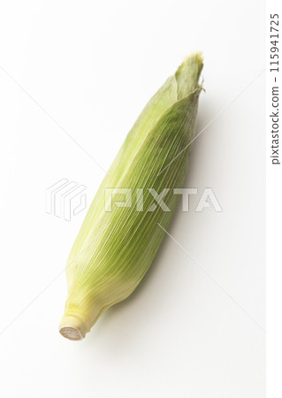 Fresh corn on a white background Fresh corn on a white background 115941725