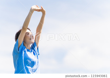 Young woman taking a deep breath lifestyle image 115943061