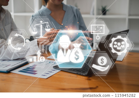 Business Professionals Discussing Private Equity Investment Strategies with Digital Financial Icons on a Modern Office Desk 115945282