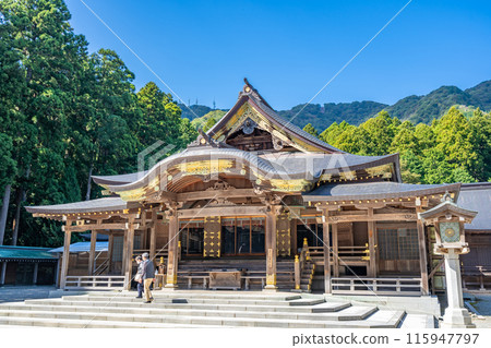 Echigo Ichinomiya Yahiko Shrine - Main Hall and Worship Hall, Sangensha Nagare-zukuri style with a veranda, set in a deep forest with Mt. Yahiko in the background 115947797