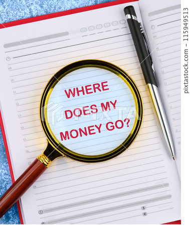 Where does all money go text viewed through a magnifying glass in a business notebook Where does all money go text viewed through a magnifying glass in a business notebook 115949513