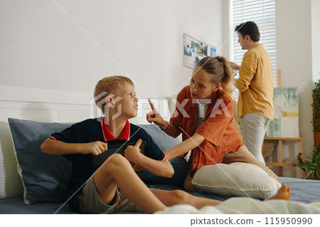 Mom Forbidding Her Son To Play On The Tablet Mom Forbidding Her Son To Play On The Tablet 115950990