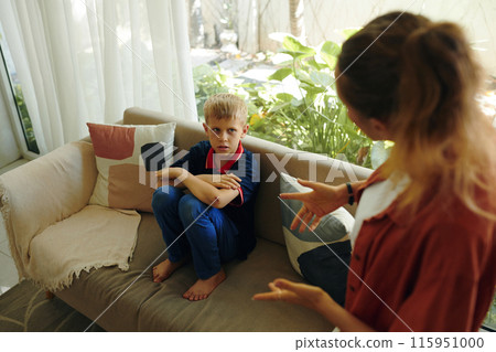 Mother Arguing With Her Son At Home 115951000