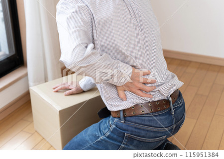 Man with back pain, backache, sudden lower back pain 115951384