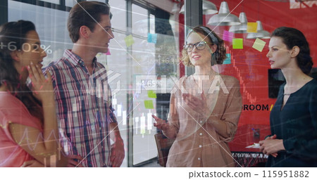 Image of financial data processing and globe over diverse business people in office Image of financial data processing and globe over diverse business people in office 115951882