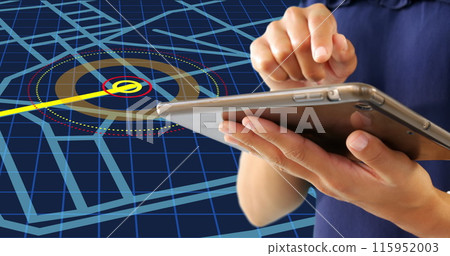 Mid section of a woman using a digital tablet against navigation map line scheme on blue background 115952003