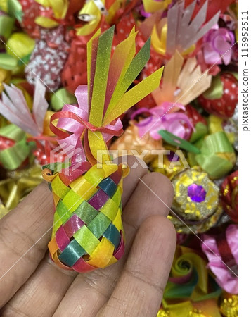 Colorful Christmas ornaments in the form of ribbons and bows Colorful Christmas ornaments in the form of ribbons and bows 115952511