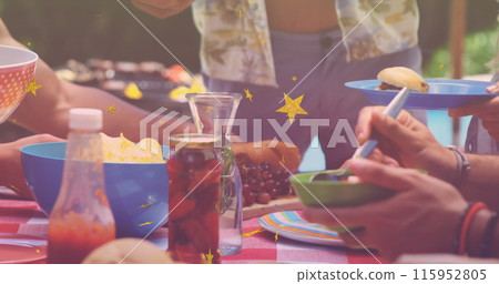 Image of stars over group of caucasian friends having bbq and talking 115952805