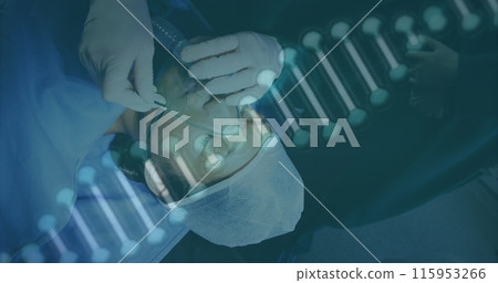 Image of dna strand spinning over caucasian male patient with oxygen mask 115953266