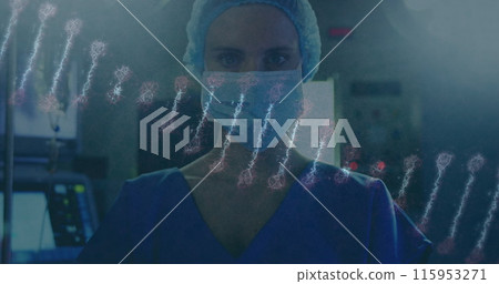 Image of dna strand over female caucasian surgeon with face mask Image of dna strand over female caucasian surgeon with face mask 115953271