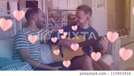 Image of hearts over diverse male couple playing guitar 115953416