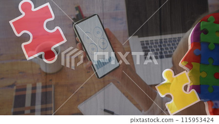 Image of colourful puzzle over caucasian woman with smartphone Image of colourful puzzle over caucasian woman with smartphone 115953424