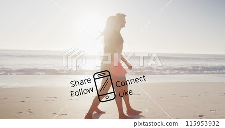 Image of share follow connect like text and icon over diverse couple walking on beach Image of share follow connect like text and icon over diverse couple walking on beach 115953932