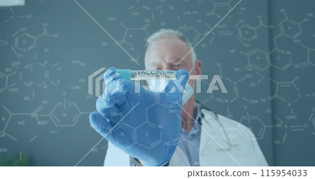 Image of chemical formula over caucasian male doctor wearing face mask 115954033
