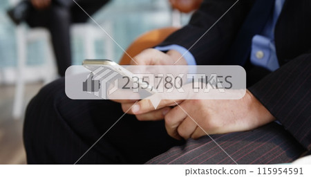 Image of media icon over hands using smartphone 115954591