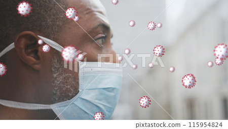 A black man walking around in the city, wearing a face mask to protect himself from air pollution an A black man walking around in the city, wearing a face mask to protect himself from air pollution an 115954824