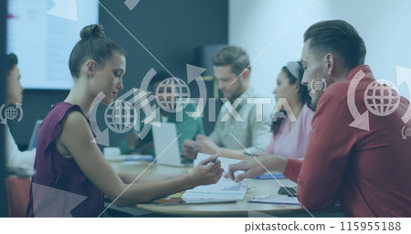 Image of globe with arrows icons over diverse business people at meeting in office Image of globe with arrows icons over diverse business people at meeting in office 115955188