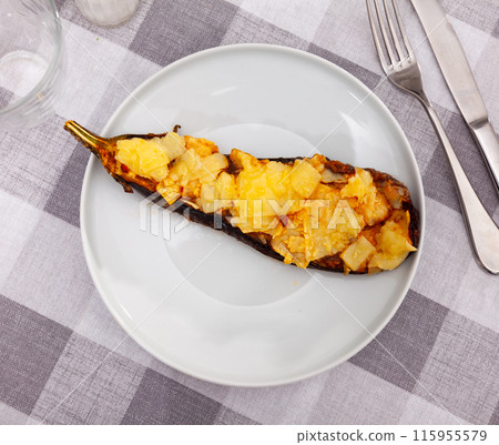 Fresh stuffed eggplant served on dining table Fresh stuffed eggplant served on dining table 115955579