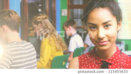 Image of happy biracial female teenager student using tablet at school Image of happy biracial female teenager student using tablet at school 115955635