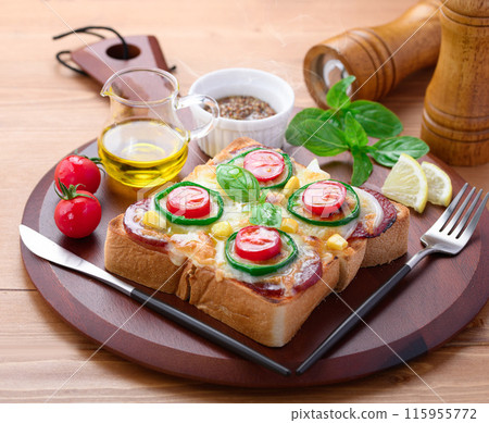 Pizza toast on a cutting board Pizza toast on a cutting board 115955772