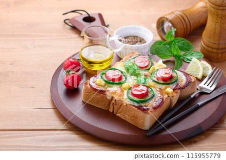 Pizza toast on a cutting board 115955779