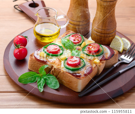Pizza toast on a cutting board 115955811