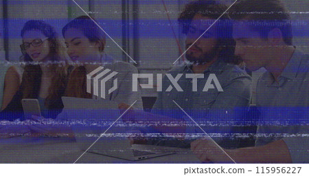 Image of screen with glitch over diverse female and male coworkers in office 115956227