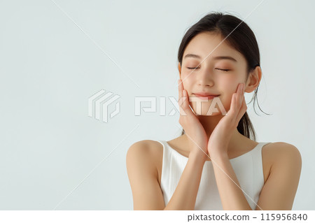 Portrait of Asian woman skin care and beauty image on white background 115956840