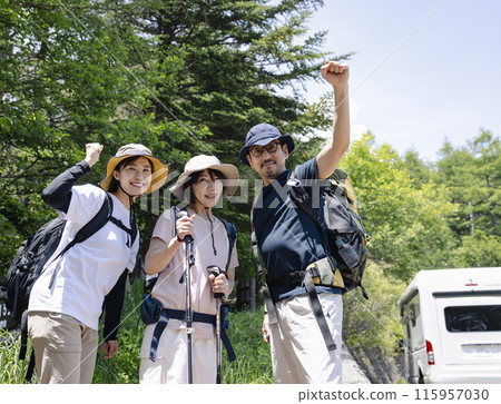 Families enjoying hiking 115957030