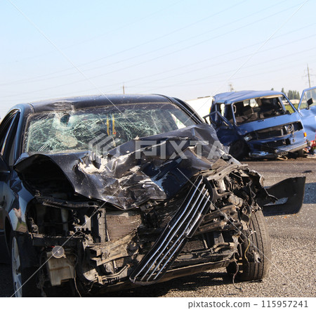 Two Cars Damaged In A Road Collision Two Cars Damaged In A Road Collision 115957241