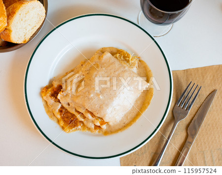 Dish of Italian cuisine is meat lasagna with delicious Parmesan cheese melted on top 115957524
